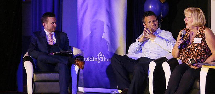 Kevin Durham facilitating a Q&A session at a conference