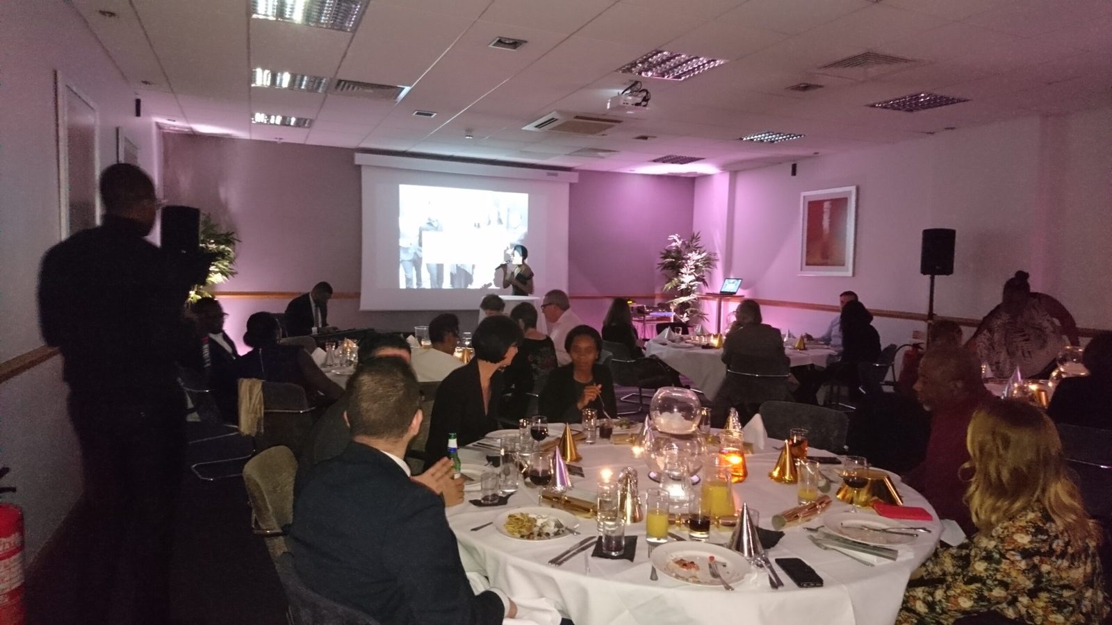 Kevin Durham hosting a corporate Christmas party dinner with team games